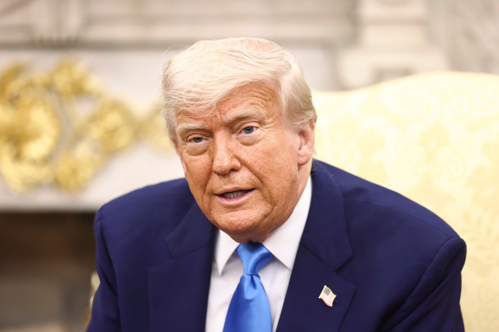 President Donald Trump speaks during a meeting in the Oval Office of the White House on May 21, 2025.