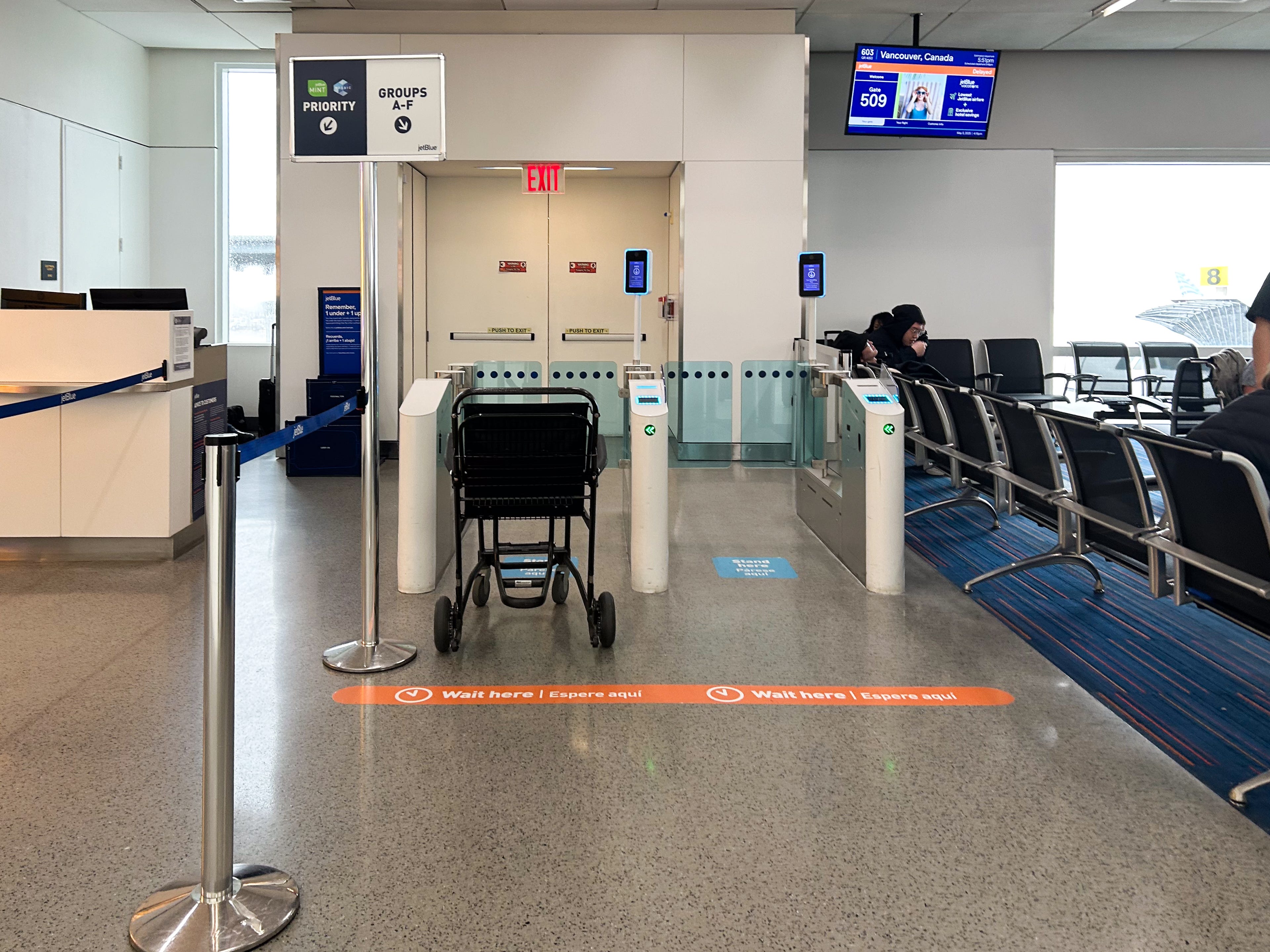Empty boarding lines at an airport gate