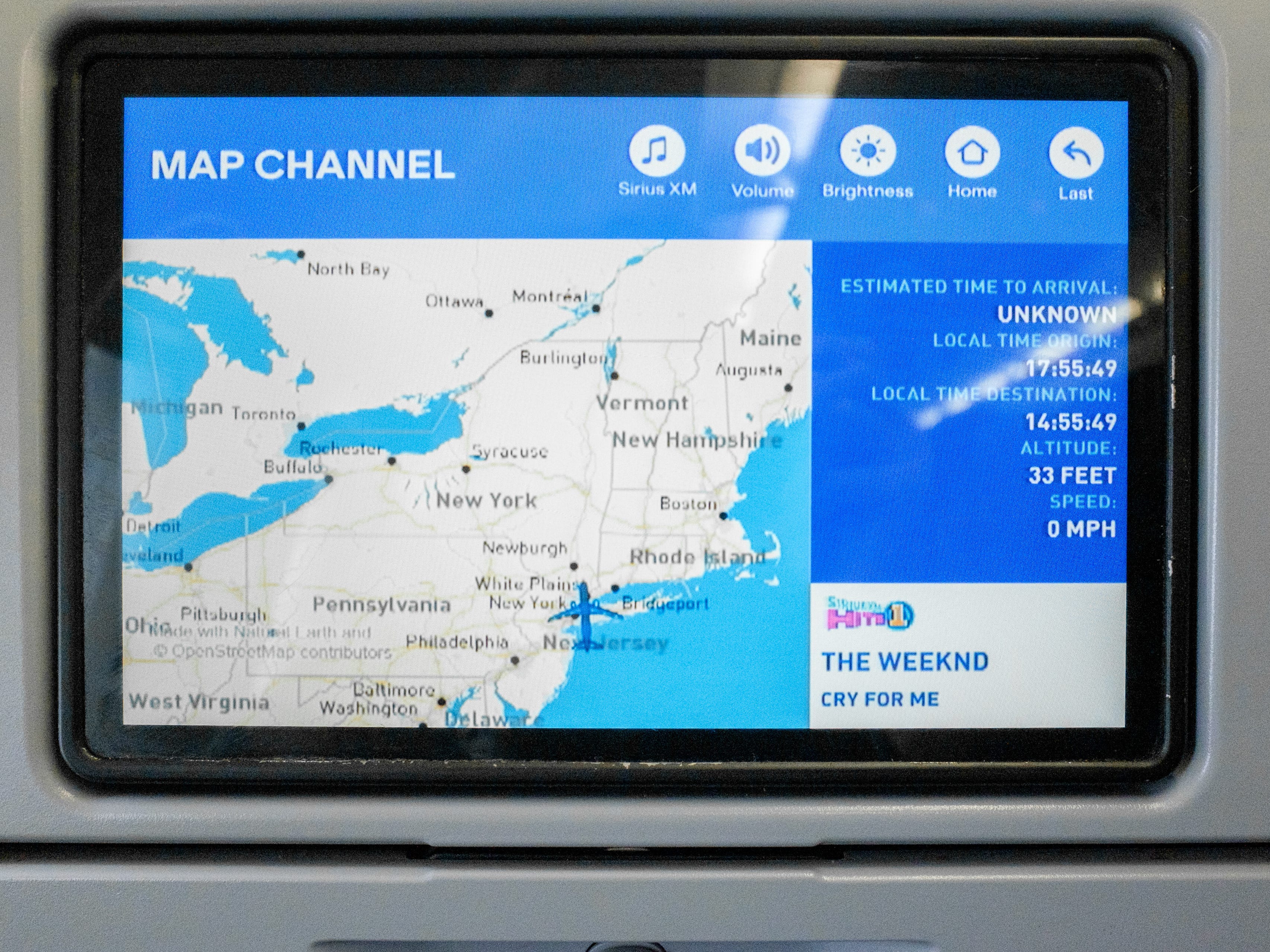 A map of the Northeast on a seatback screen on a plane