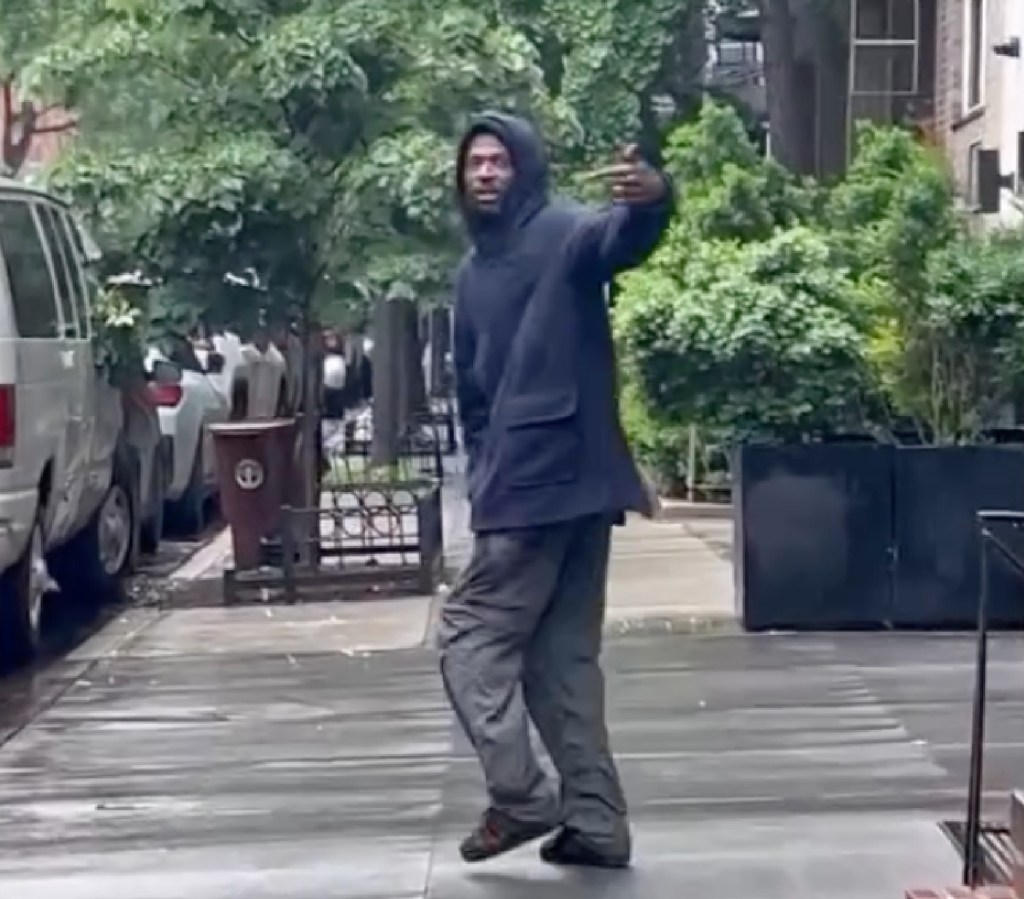 Footage as Hall followed the stranger after the attack.
