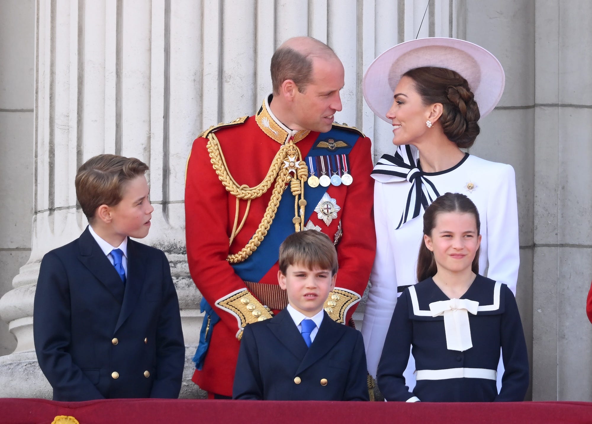 Prince William, Kate Middleton, Prince George, Prince Louis, and Princess Charlotte stand on the balcony of Buckingham Palace for Trooping the Colour 2024.