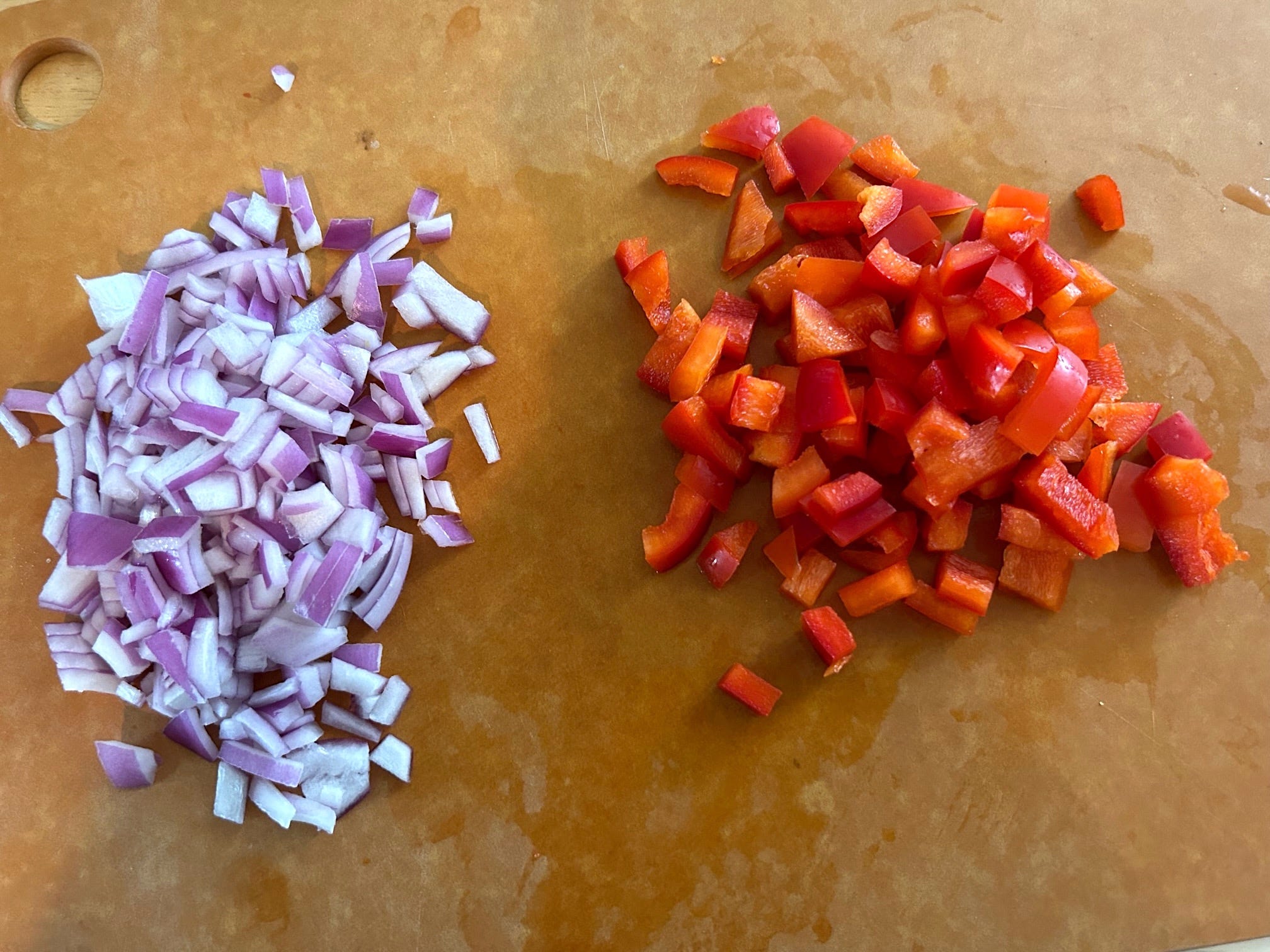 Chopping veggies for Ina Garten's Greek Orzo Salad