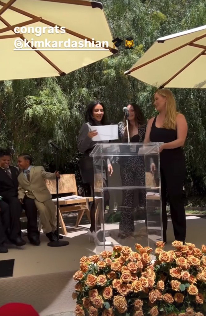 Kim Kardashian on stage at her private graduation ceremony