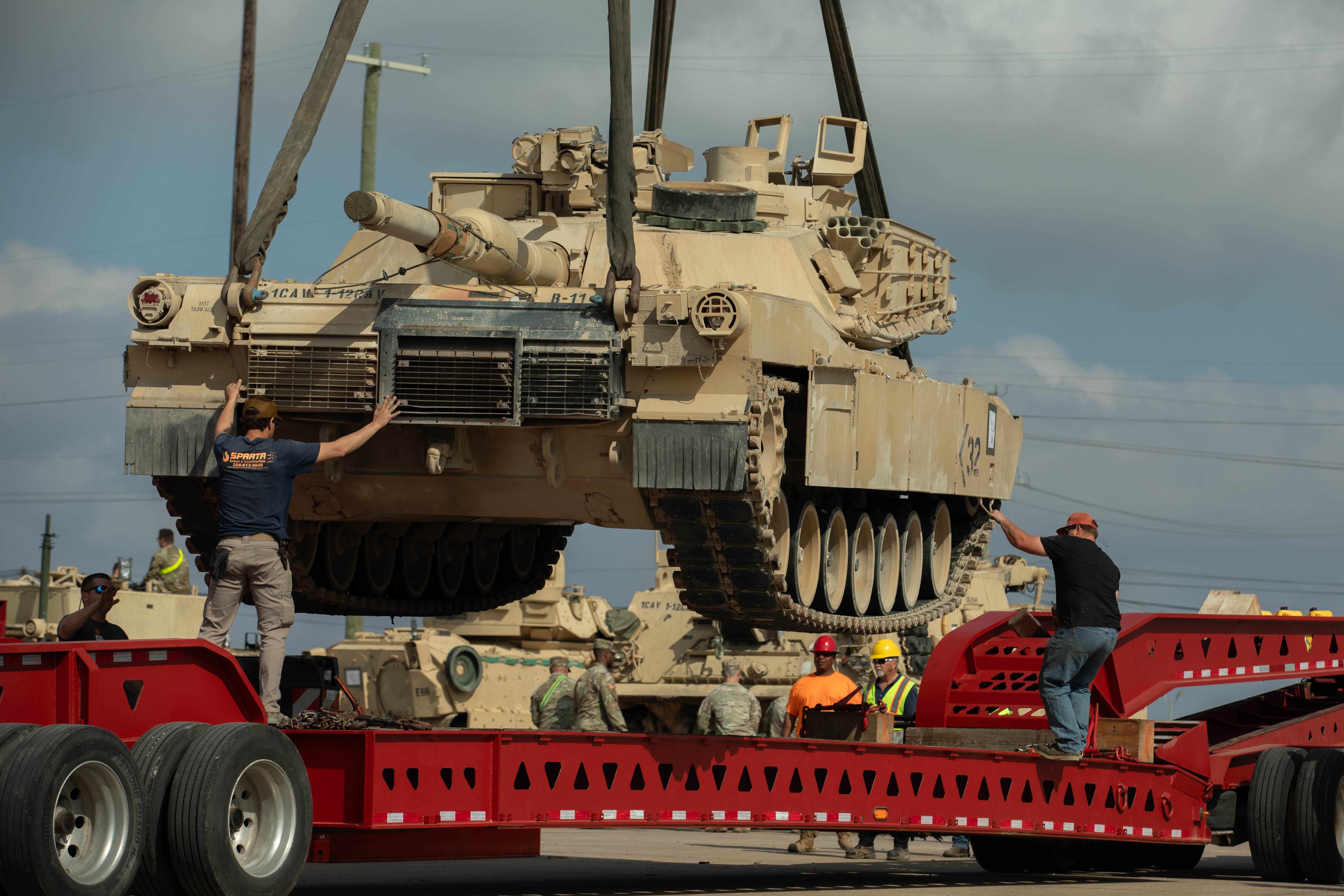 An M1A1 SEP V3 Abrams is loaded on to a heavy equipment movement truck on Fort Cavazos, Texas, March 4, 2024.