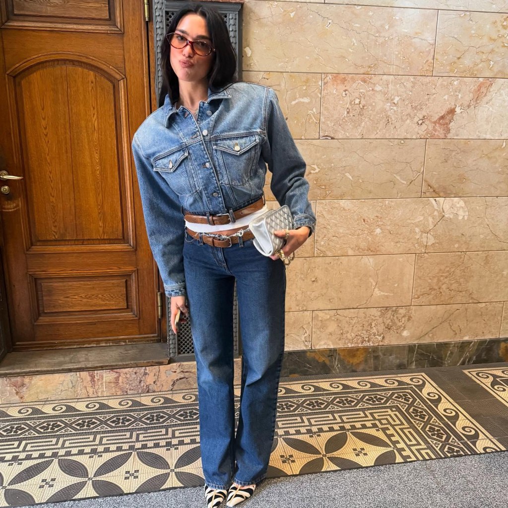 Dua Lipa sports an all denim look.