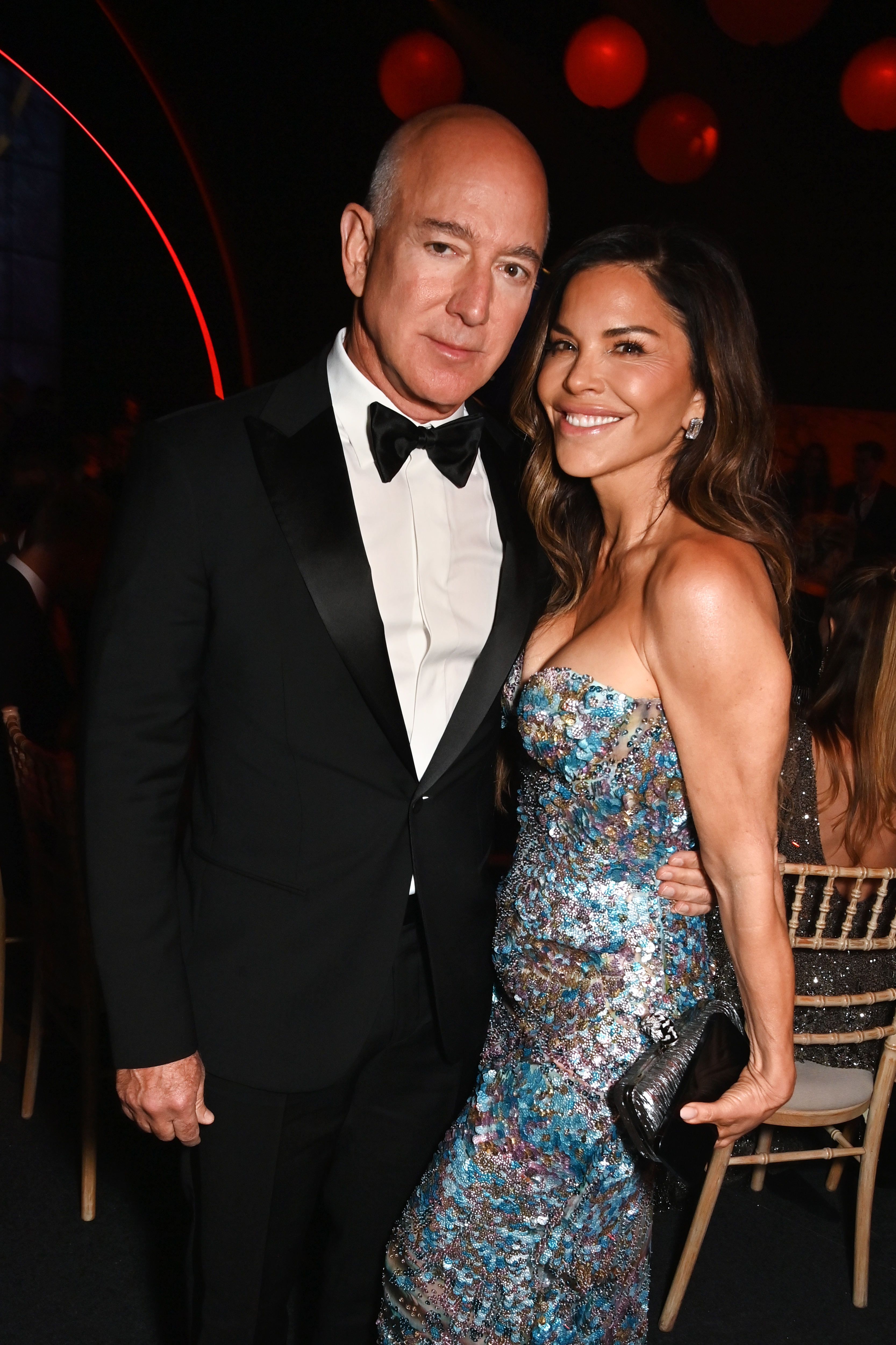 Lauren Sánchez and Jeff Bezos stand together at the amfAR Gala. 
