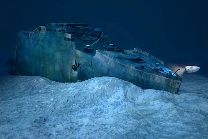 A rendering of OceanGate's Titan exploring the shipwreck of the Titanic at the bottom of the North Atlantic Ocean. 