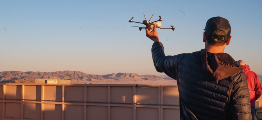 A team of Department of Defense drone operators and experts test the technical capabilities of various Uncrewed Aerial Systems during a Defense Innovation Unit-led prize challenge at Marine Corps Air Ground Combat Center, Twentynine Palms, Calif., in November 2024. 