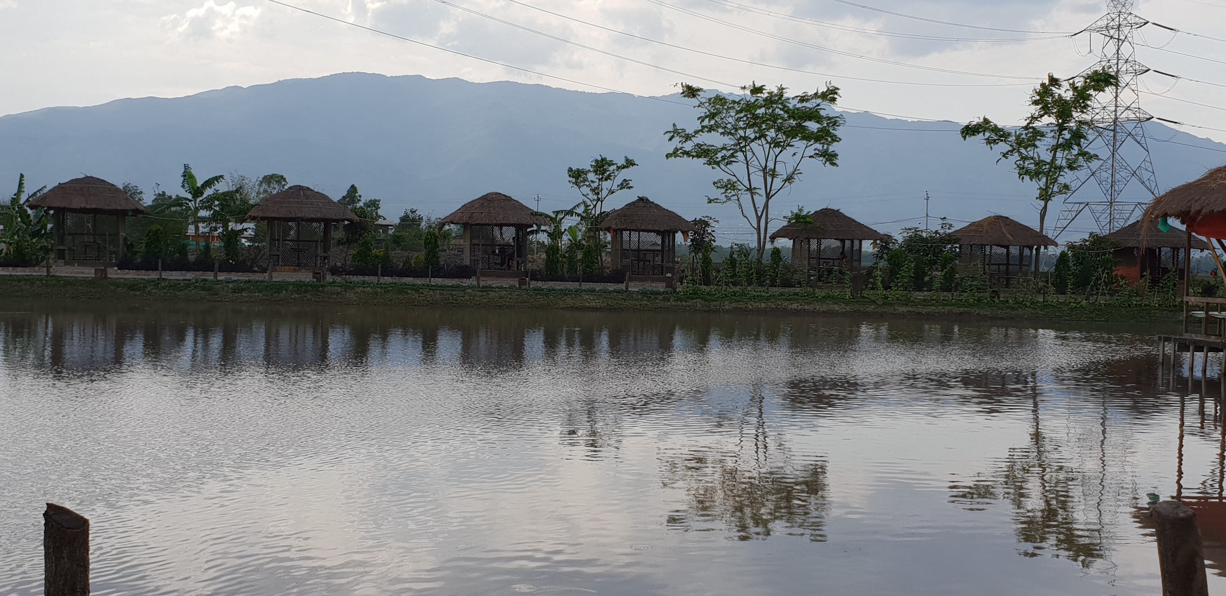 Row of homes next to water in Manipur