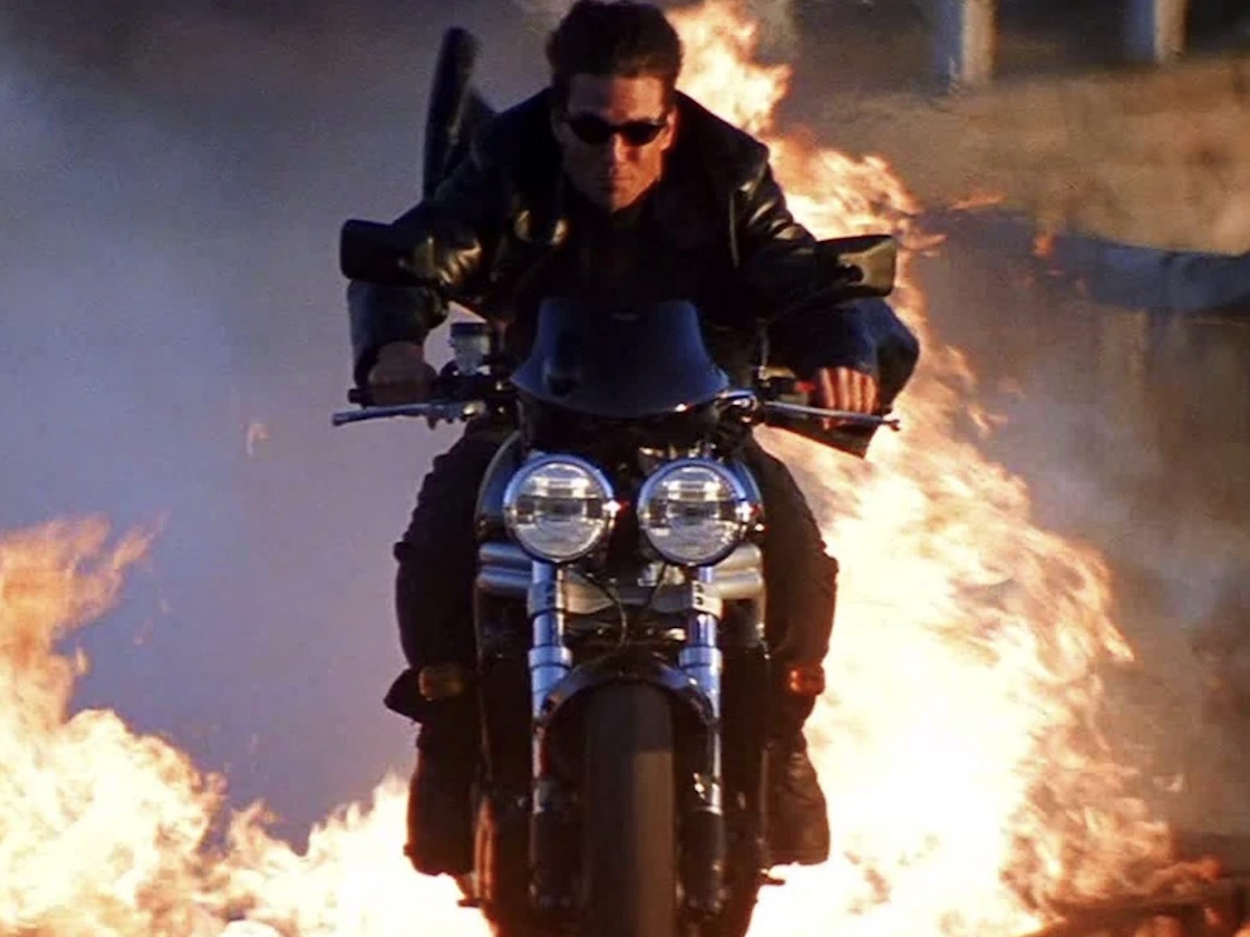 Tom Cruise riding a motorbike in "Mission: Impossible 2."