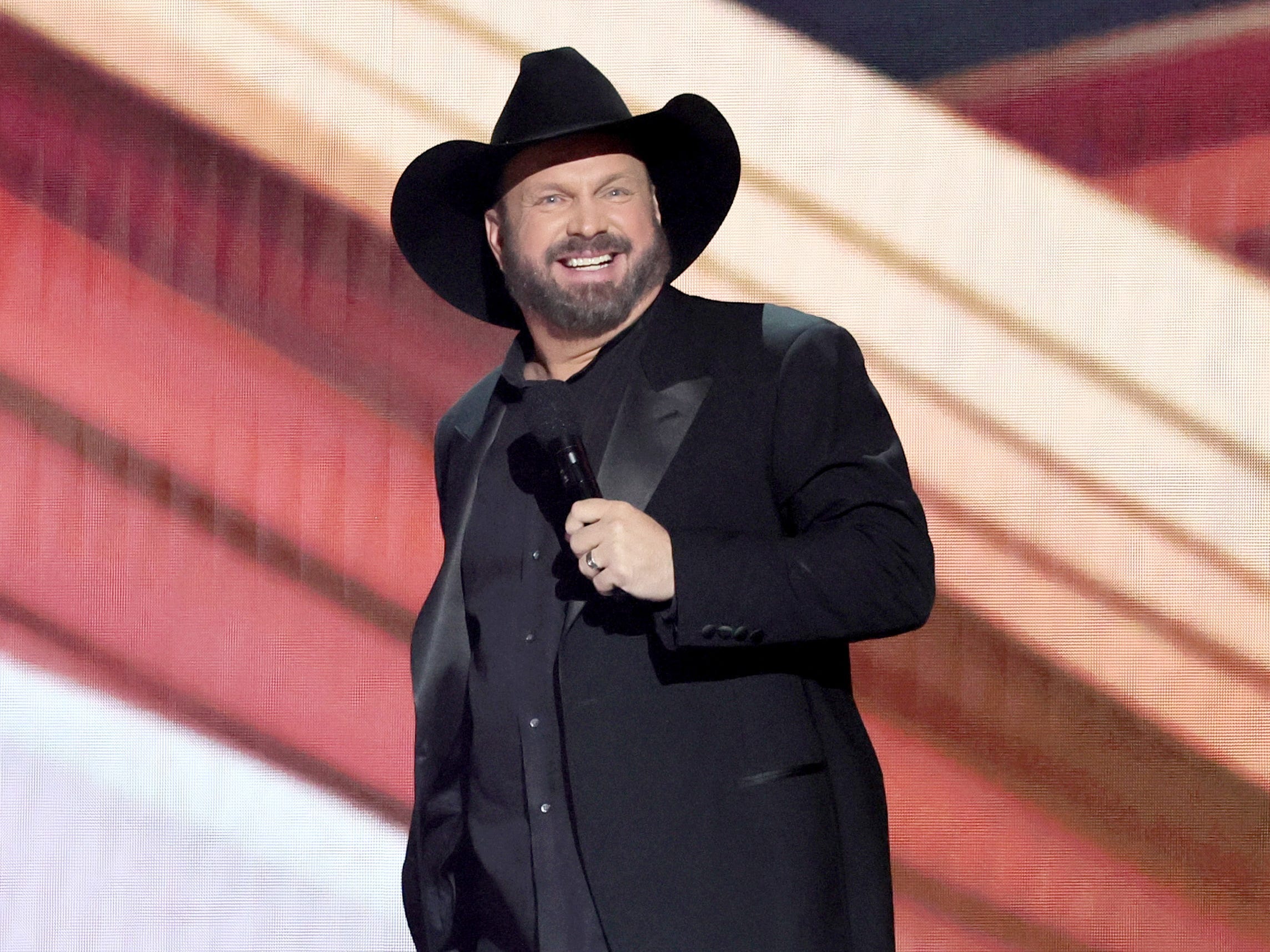 Co-host Garth Brooks speaks onstage during the 58th Academy Of Country Music Awards at The Ford Center at The Star on May 11, 2023 in Frisco, Texas