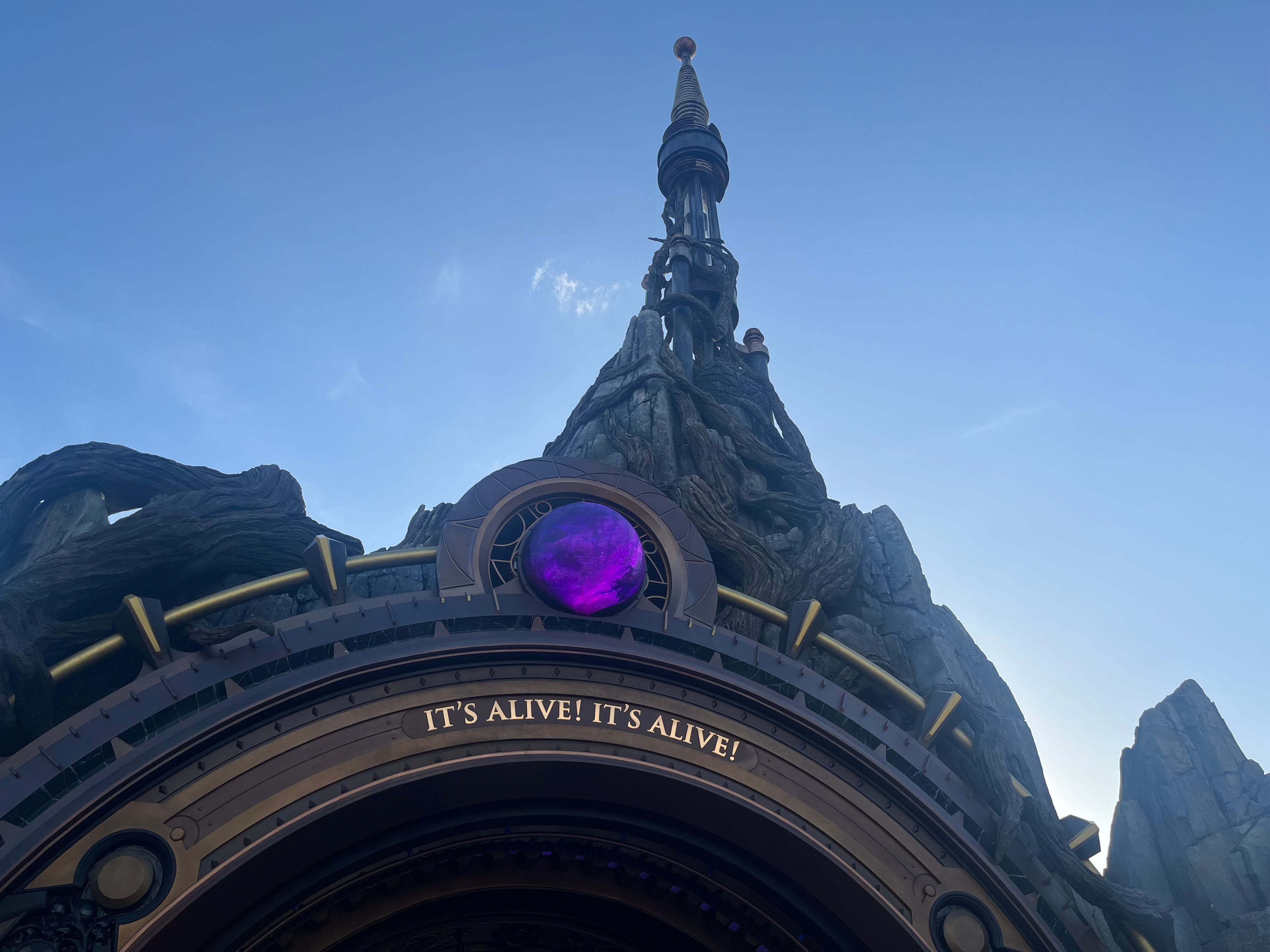 Dark Universe "portal" entrance arch with stone castle above it