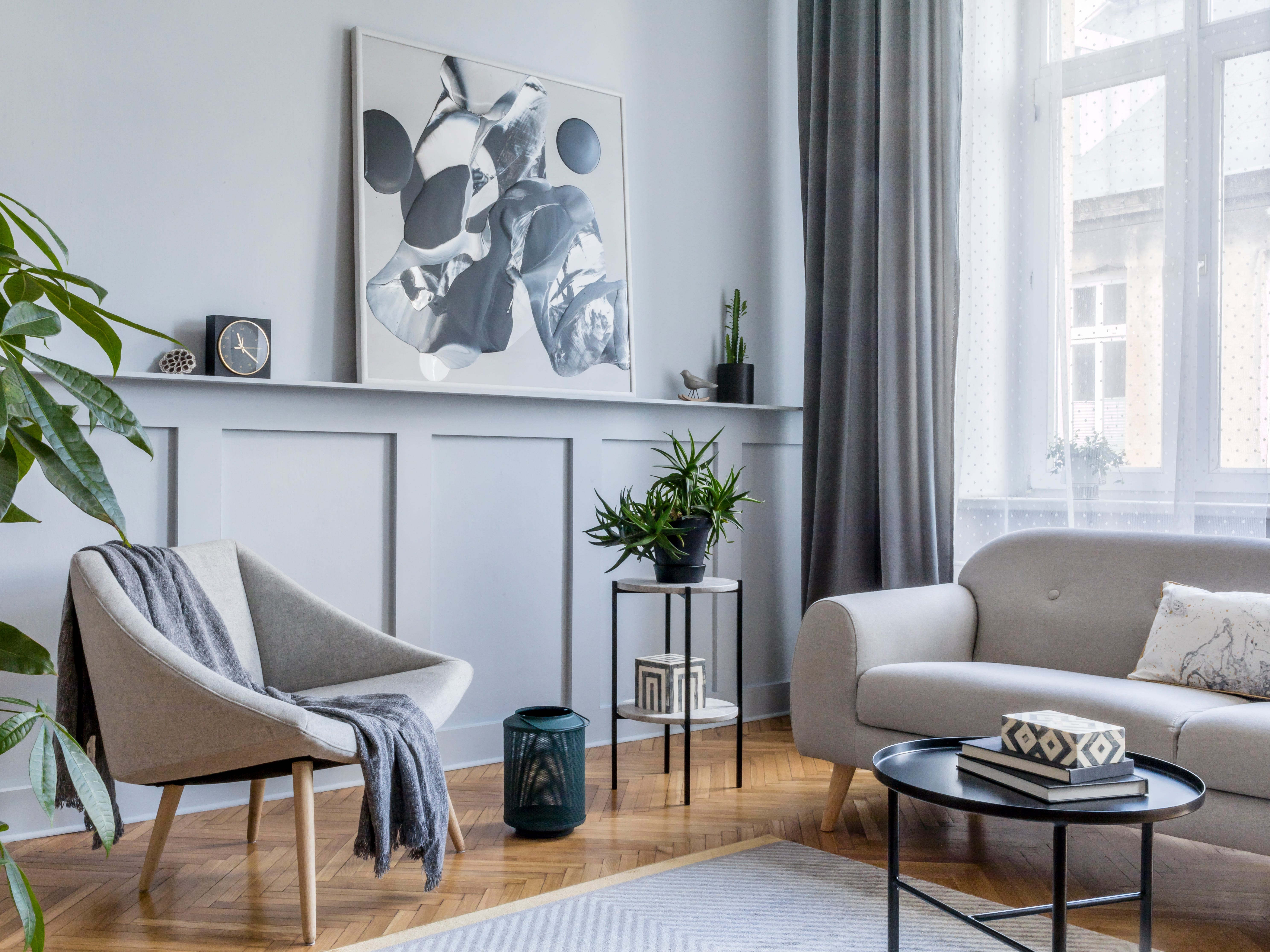gray living room with panels and small coffee table