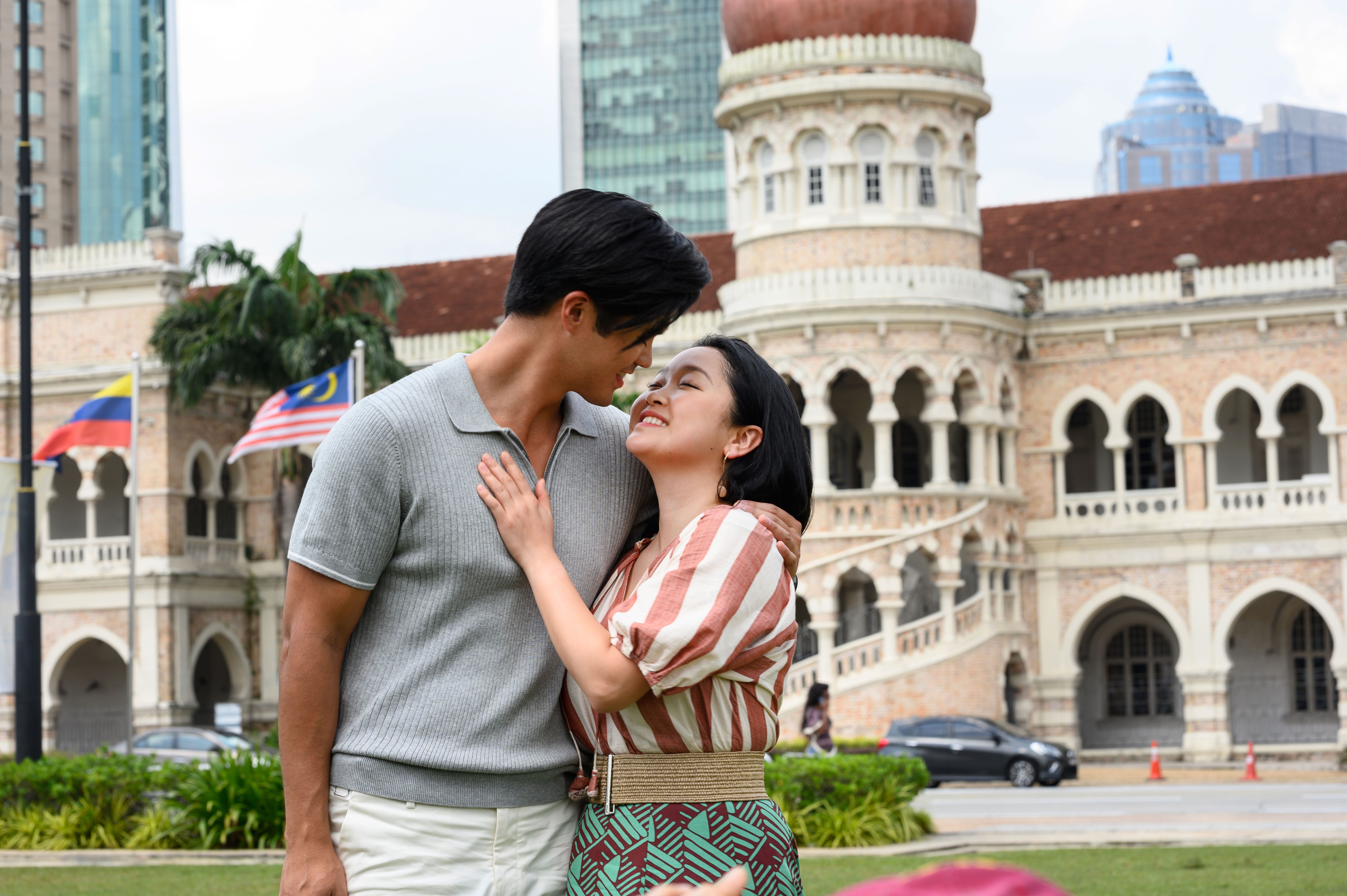 A couple smiling at each other in the movie "Worth the Wait."