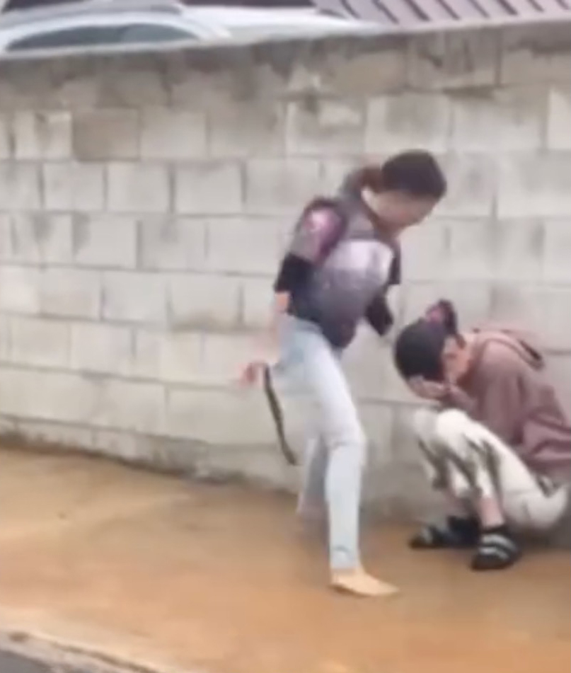 Young woman with special needs being surrounded and attacked by four bullies in Hawaii