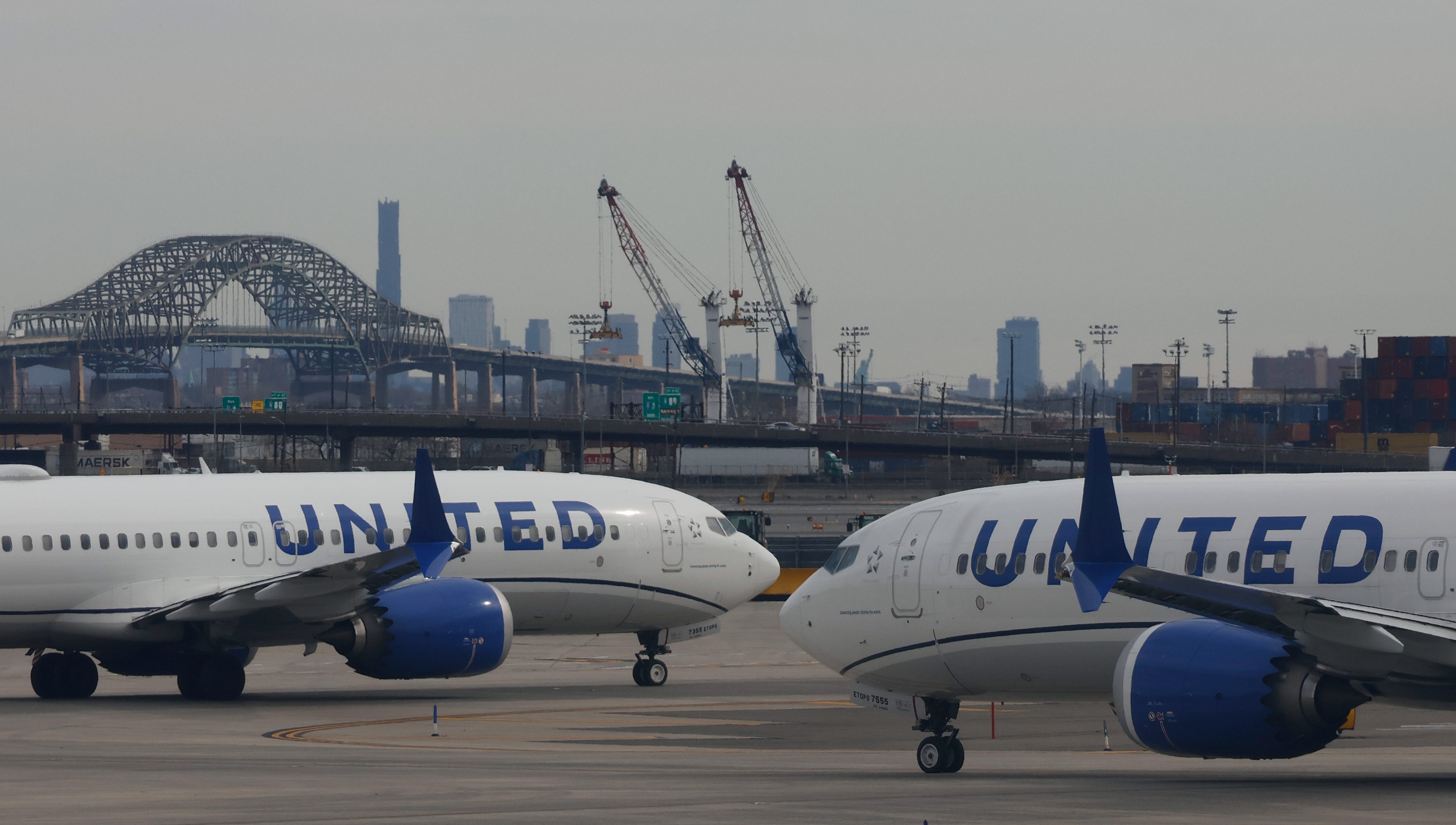 United Airlines airplanes proceed to a runway at Newark Liberty International Airport on February 20, 2025, in Newark, New Jersey.