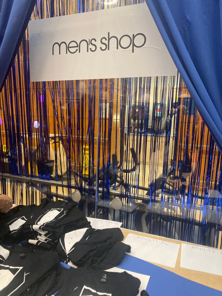 Repurposed hospital recreation room transformed into a designer 'Promingdale's' shop with donated dresses, tuxes, accessories and onsite nail and makeup artists for patients and staff
