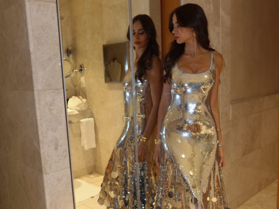 Jess Work's most expensive listing on Pickle is a sparkly, silver dress.