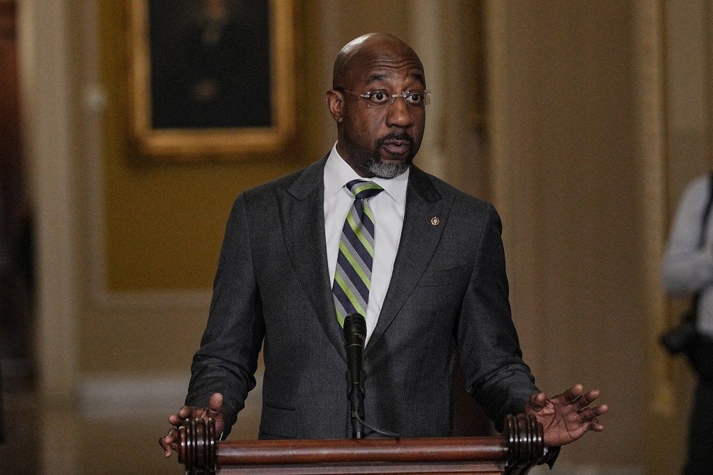 U.S. Senator Raphael Warnock speaking during a press conference at Capitol in Washington, D.C., on May 20, 2025.