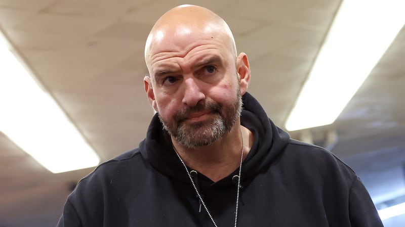 U.S. Sen. John Fetterman (D-PA) speaks to reporters before a Senate luncheon at the U.S. Capitol on December 12, 2023 in Washington, DC.