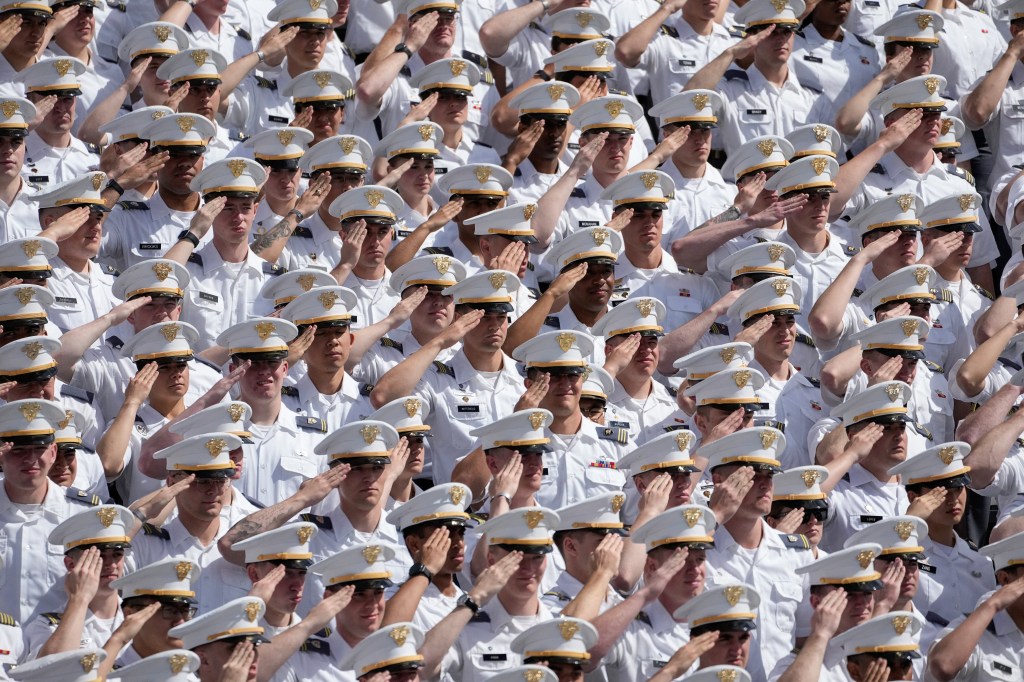 Cadets salute during the commencement ceremony at West Point Military Academy in West Point, New York, U.S., May 24, 2025