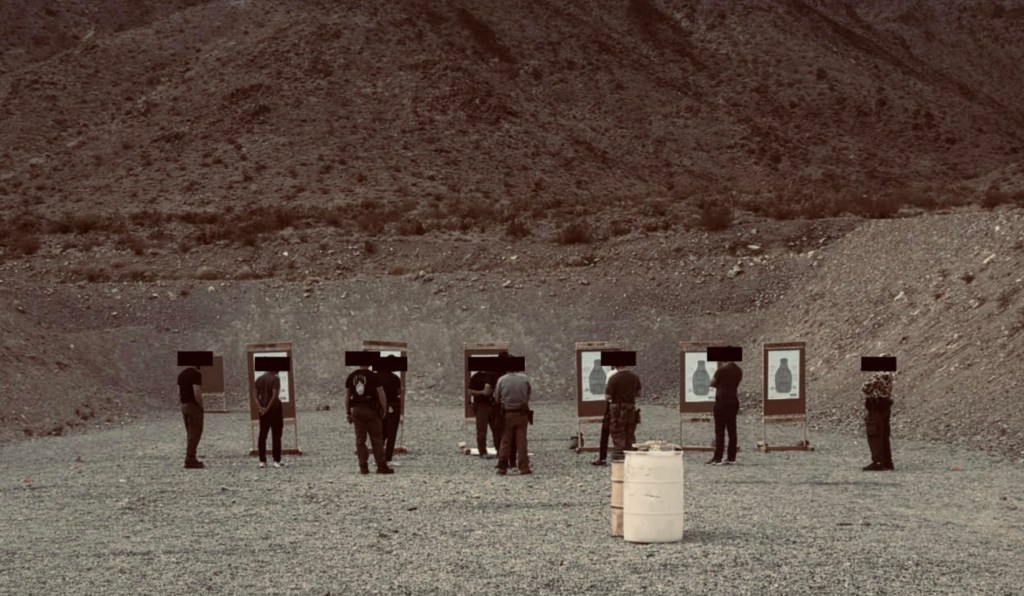 A photo of the execs at a range.