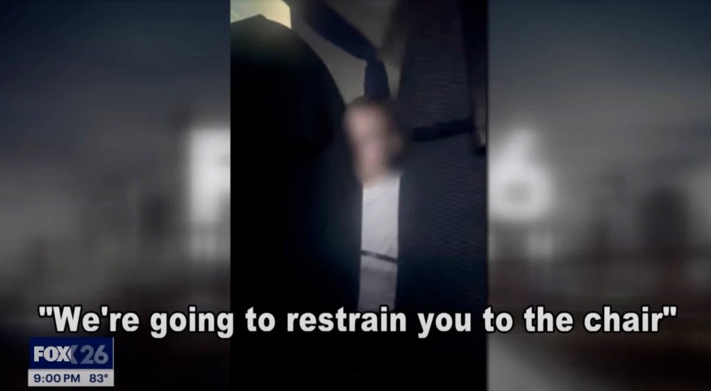 Panicked travelers restrained an out-of-control passenger who tried to open a cabin door midair.