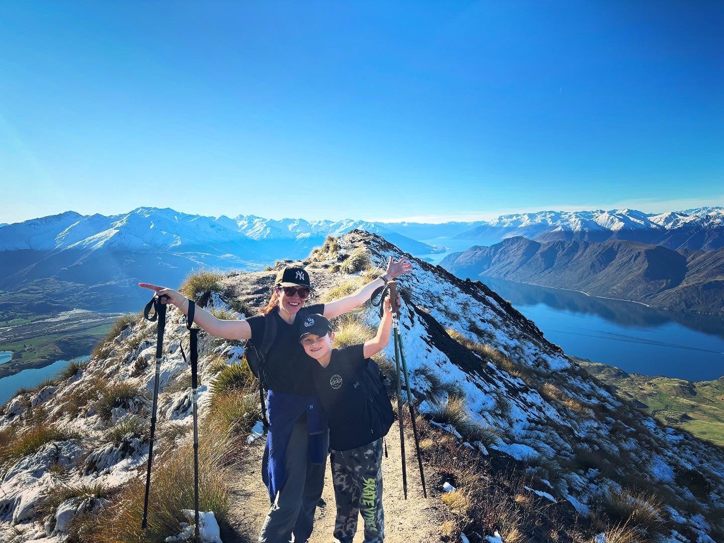 The author and her son hiking up Roy's Peak in New Zealand.