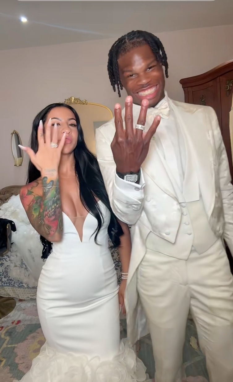 Travis Hunter and his fiancée, Leanna Lenee.