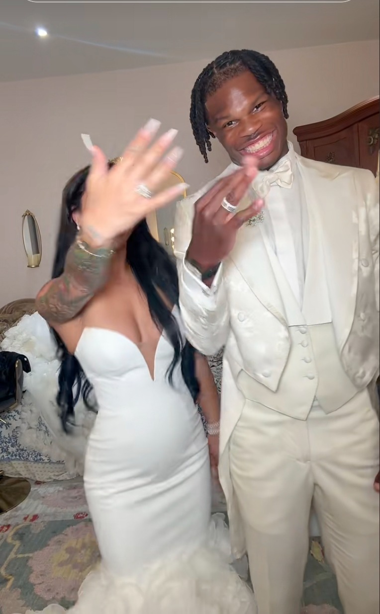 Travis Hunter and his fiancée, Leanna Lenee.