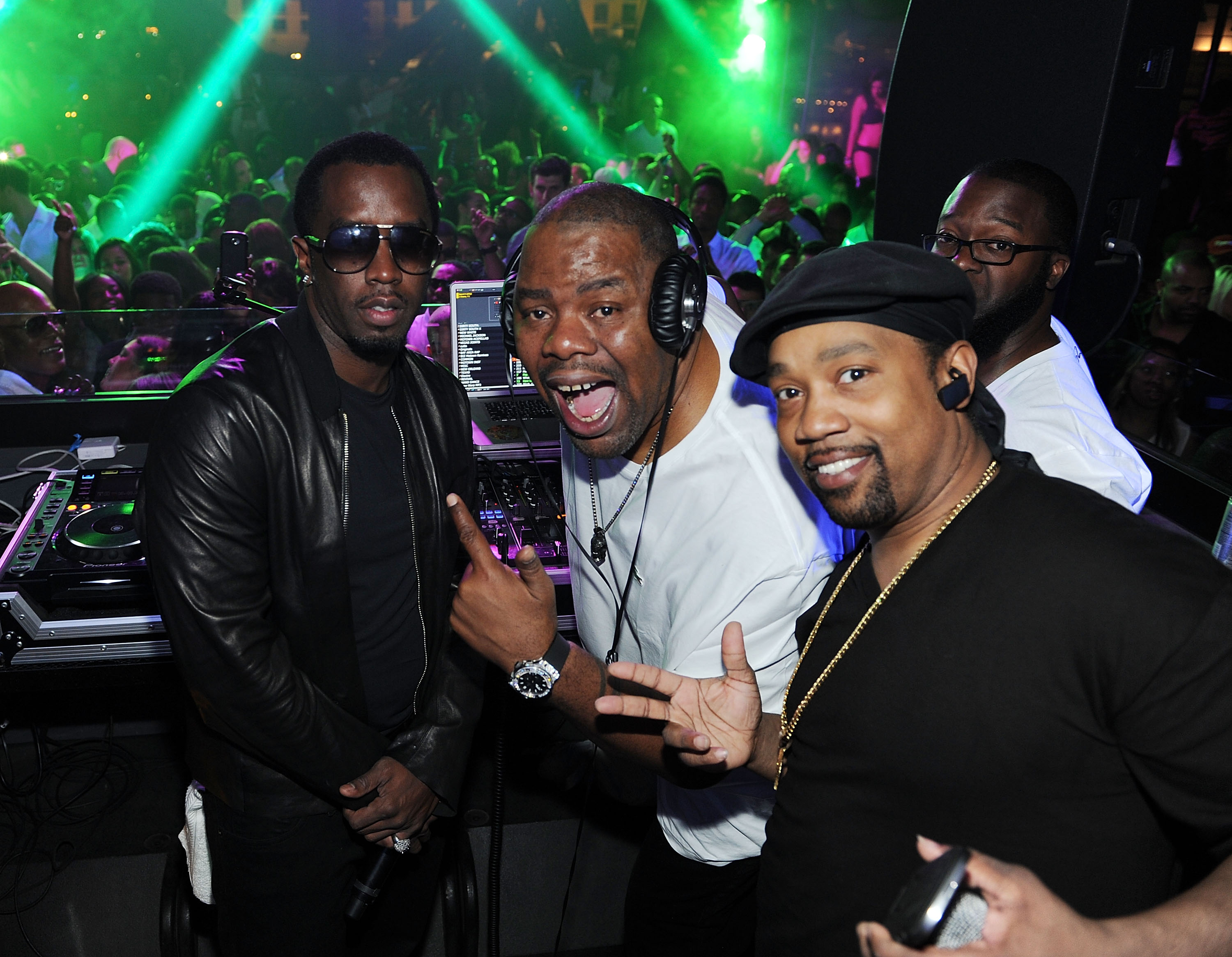 Sean Combs, DJ Biz Markie and Cool V at a Memorial Day party in 2012
