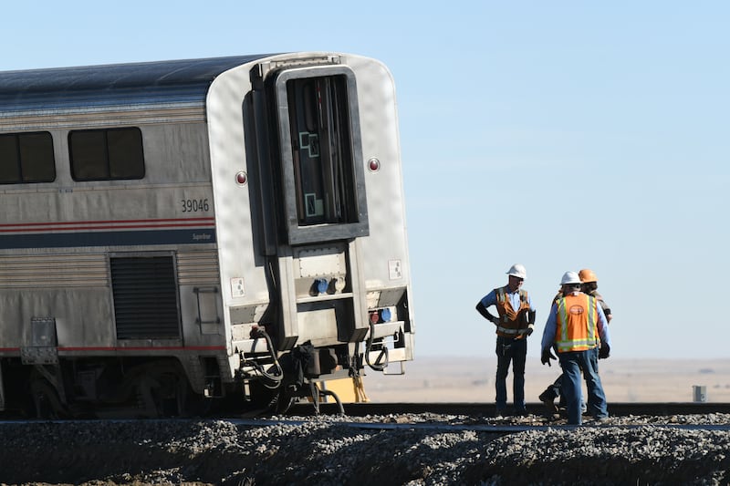 An Amtrak work crews clears the site after a California Zephyr Amtrak train derailed in Weld County, Colorado on Monday night after colliding with a milk truck on January 30, 2024.