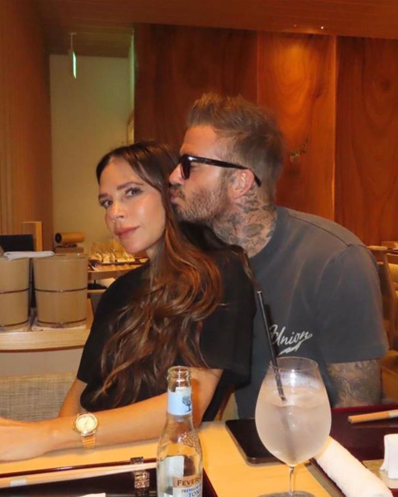 David and Victoria Beckham pose for a photo.
