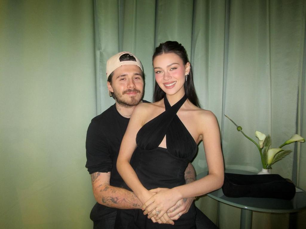 Brooklyn Beckham and Nicole Peltz pose together.