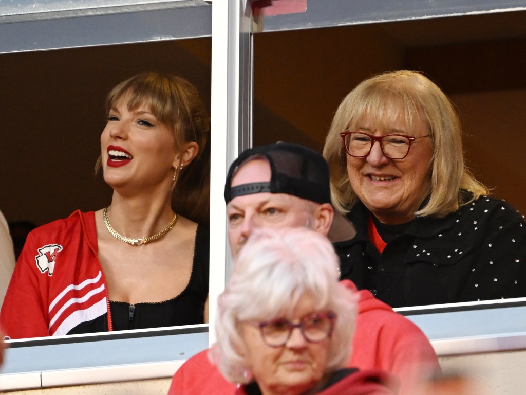 Taylor Swift, left, and Donna Kelce, mother of Chiefs tight end Travis Kelce get ready to watched the game at GEHA Field at Arrowhead Stadium on October 12, 2023 in Kansas City, Missouri.
