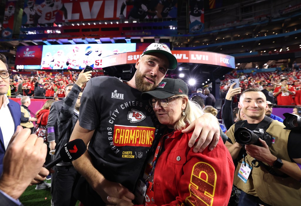 Travis Kelce #87 of the Kansas City Chiefs celebrates with Donna Kelce after defeating the Philadelphia Eagles 38-35 in Super Bowl LVII at State Farm Stadium on February 12, 2023 in Glendale