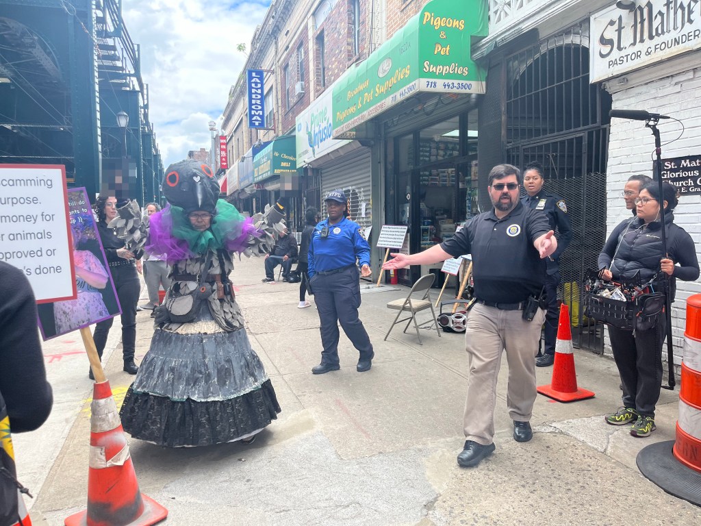 Pigeon-costumed activists arguing with NYC pet shop owners