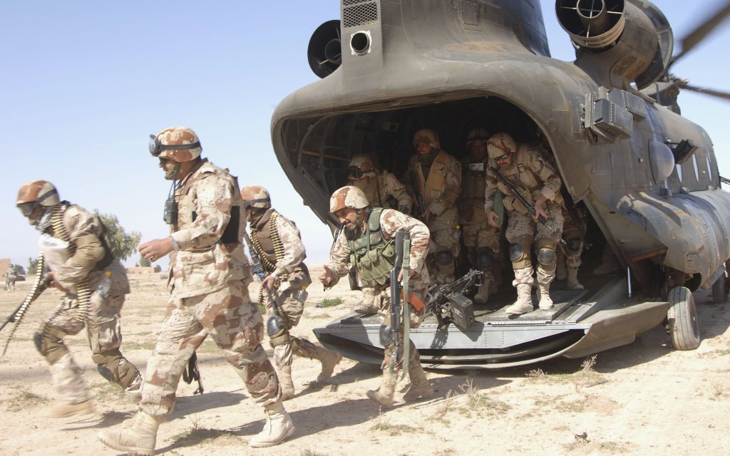 Iraqi Army Soldiers from 4th Iraqi Army Division exiting a CH-47 Chinook helicopter during Operation Swarmer in Brassfield Mora, Iraq.