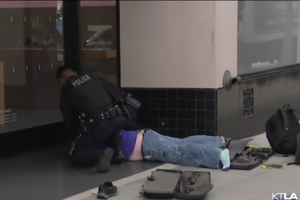 Officers tackled the suspect to the ground after he resisted detention when they arrived and confronted him