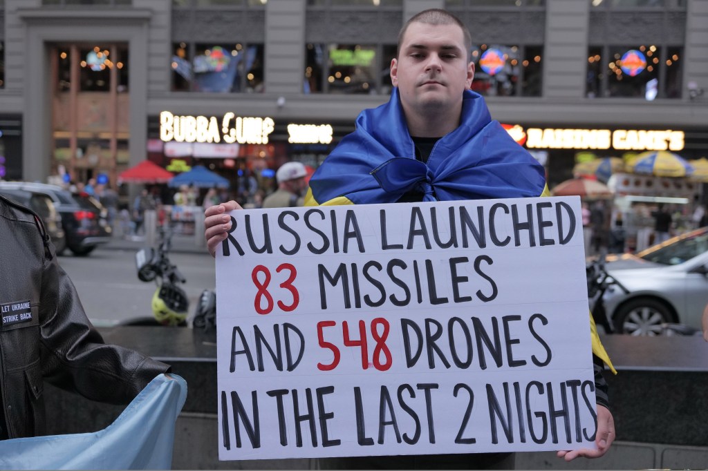 Pro-Ukraine protest in Times Square, New York on May 25, 2025, with people demanding an end to the war with Russia and the release of Ukrainian prisoners with Josh Kline present.