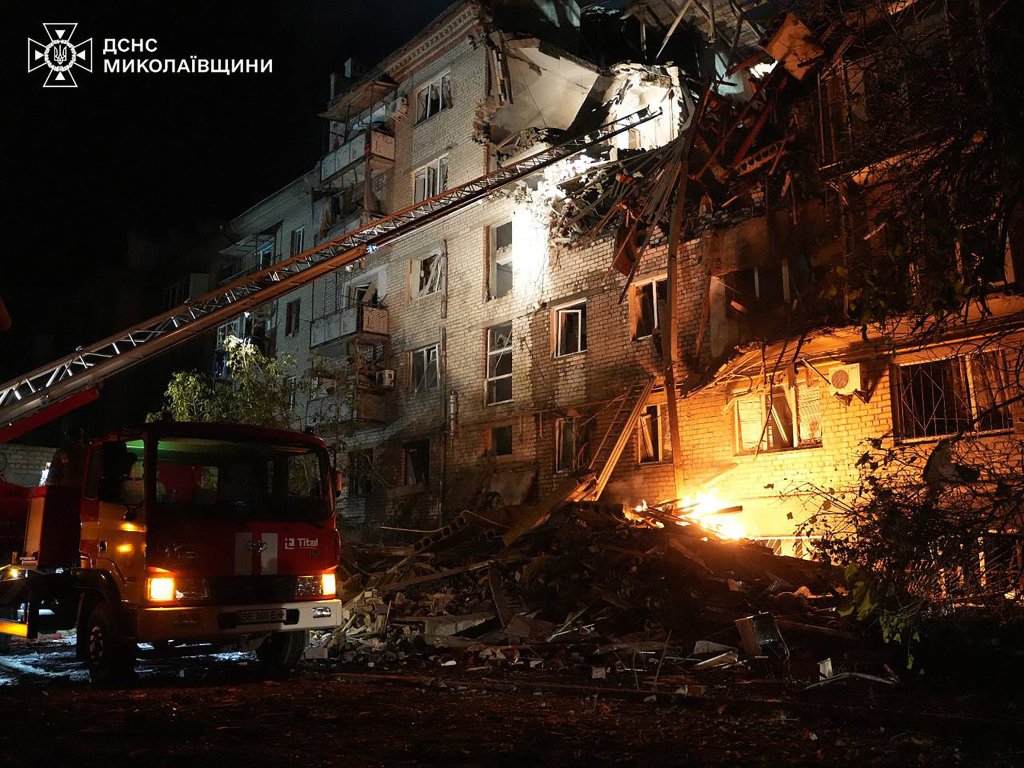 Rescuers operating from a crane on a damaged building due to a Russian strike in Mykolaiv, Ukraine on 25th May 2025