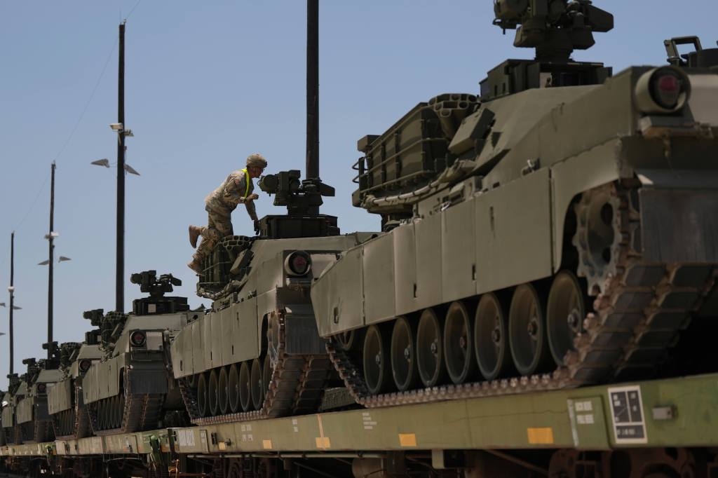US Army personnel load and secure military tanks for transport to Washington, D.C., Thursday, May 22, 2025, at Fort Cavazos near Killeen, Texas.