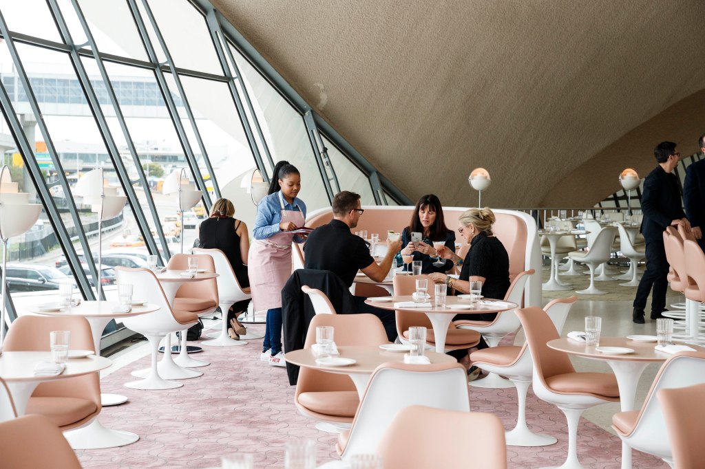 The Paris Café by Jean-Georges is located in its original location up the curving staircase on the mezzanine level.