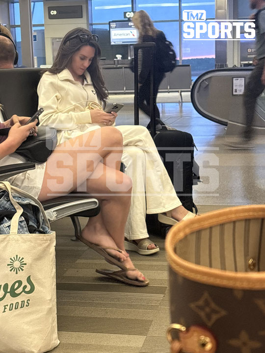 Jordon Hudson at the airport.