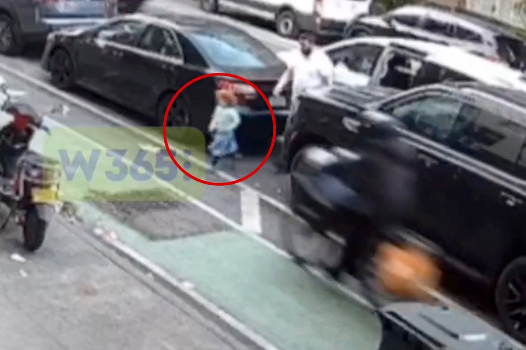 The footage, posted on X by Williamsburg 365 News, shows the unaware tot, who appeared to have just stepped out of a double-parked car with a man -- trotting into the lane at Bedford and Park avenues around 7:40 p.m. Sunday when the oncoming cyclist mowed her down. 
