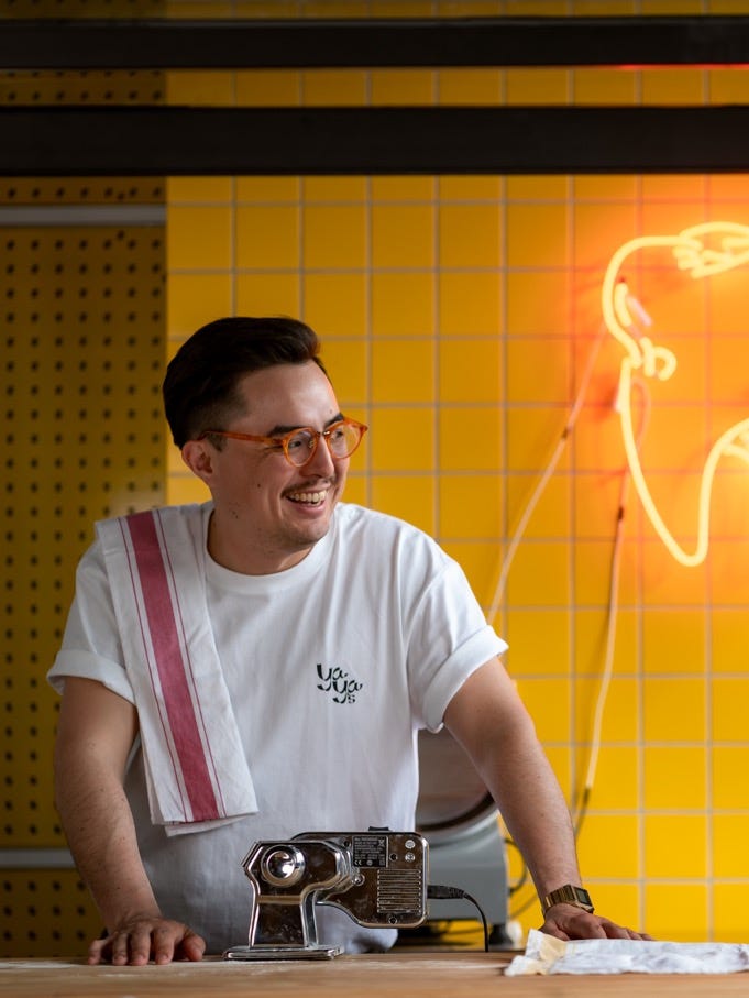 Andrew Moo is making pasta at Yaya's in Shanghai.