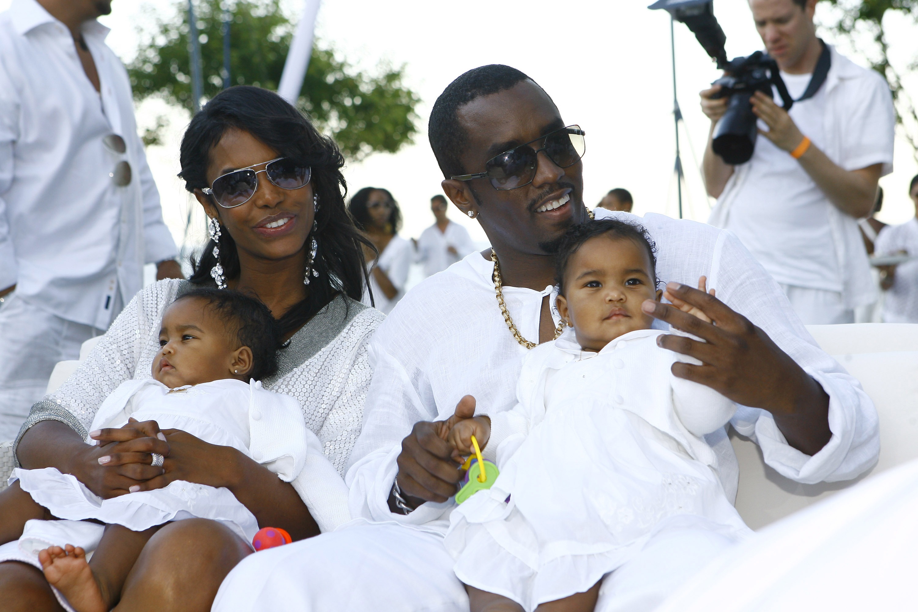 Kim Porter and Diddy with their twin girls.