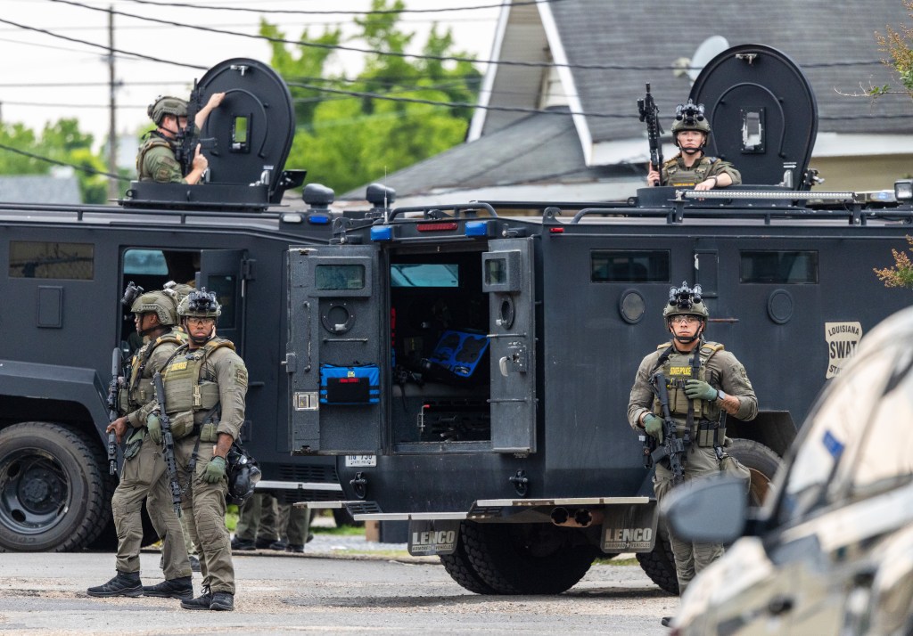 Law enforcement search for a fugitive that escaped a prison in New Orleans, Wednesday, May 21, 2025.