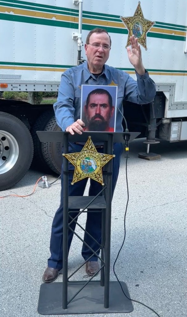 Arvi Lind discussing the fatal incident of a man armed with garden shears at a Polk County Sheriff's Office press conference.