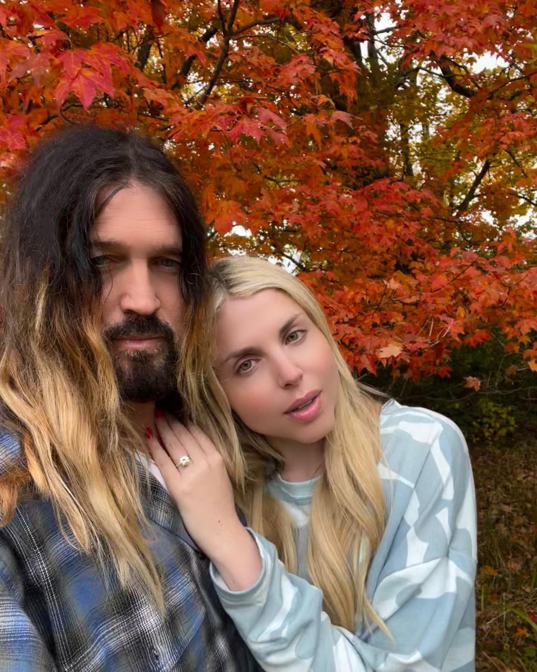 A selfie of Billy Ray Cyrus and Firerose
